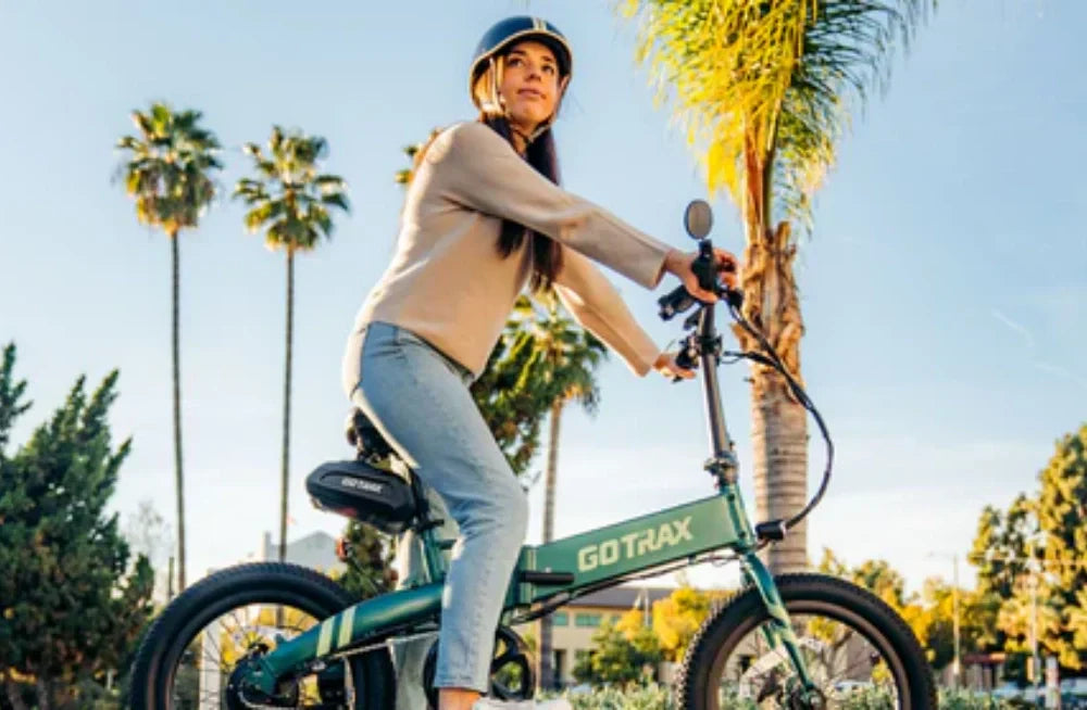 a woman ride gotrax f1v2 ebike
