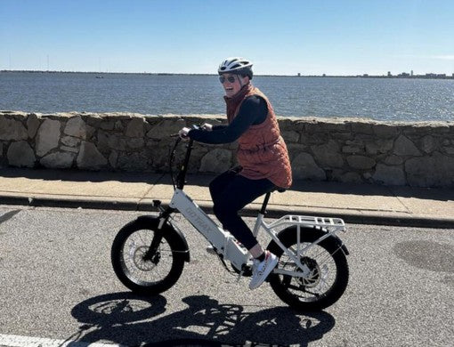 Winter exercise on an electric bike, enjoying outdoor fitness even in the cold