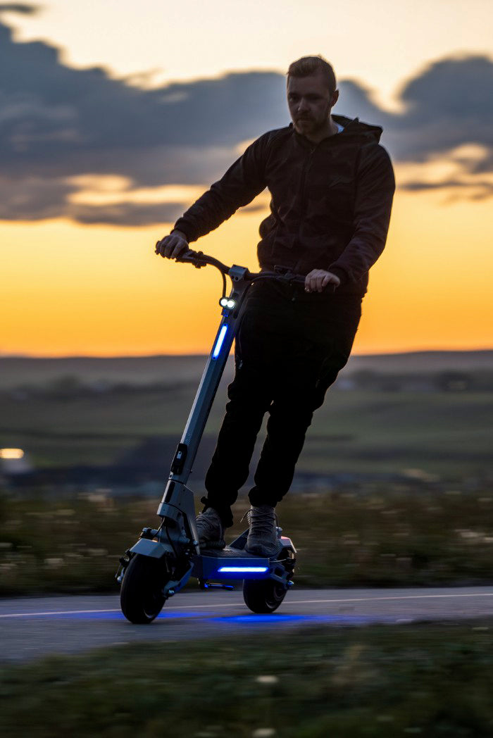 Night ride on an e-scooter equipped with bright LED lights