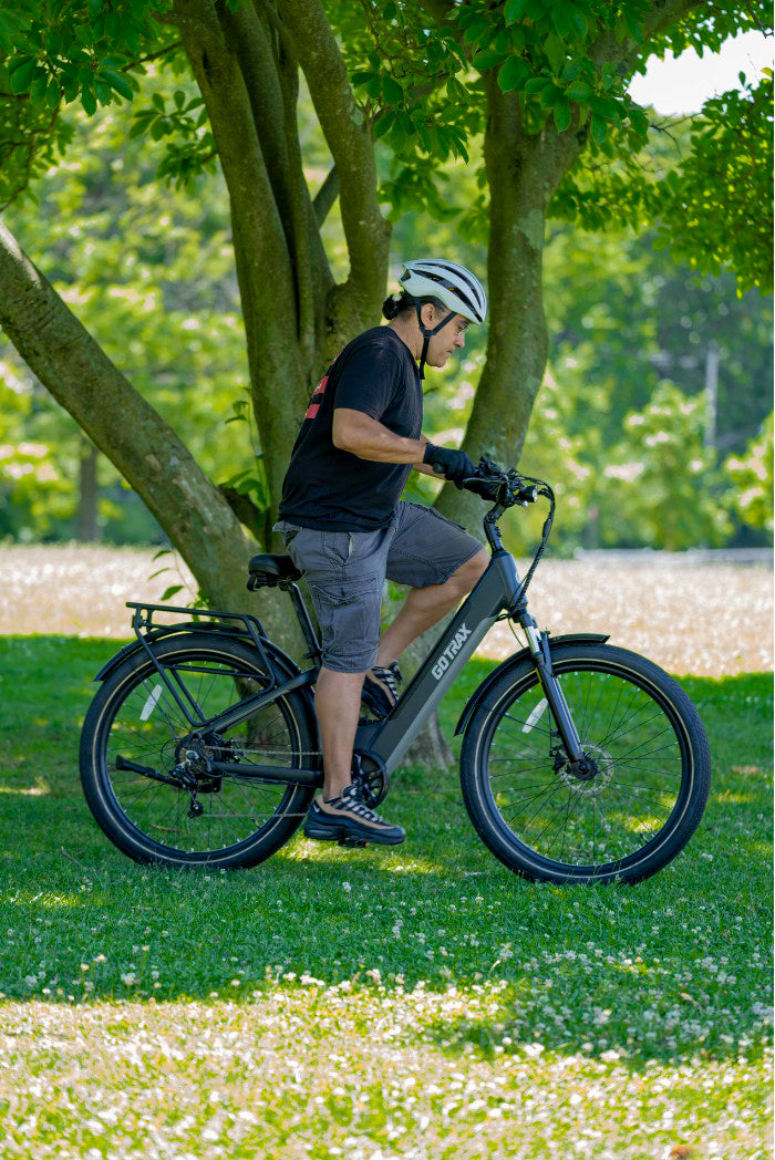 Cruising through park trails with electric bike for weekend relaxation